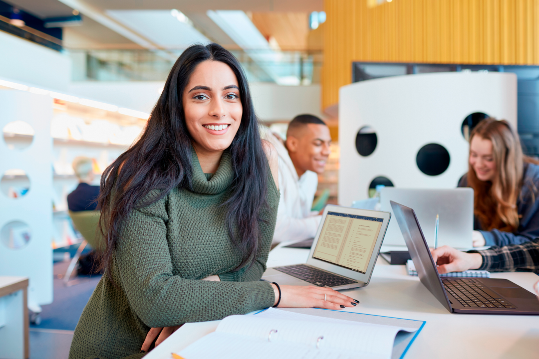 Woman using university research transcriptions