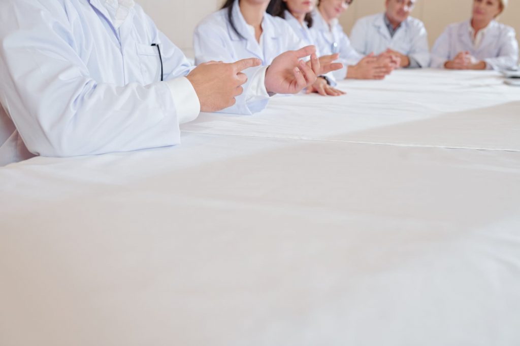 Scientists discussing in a meeting